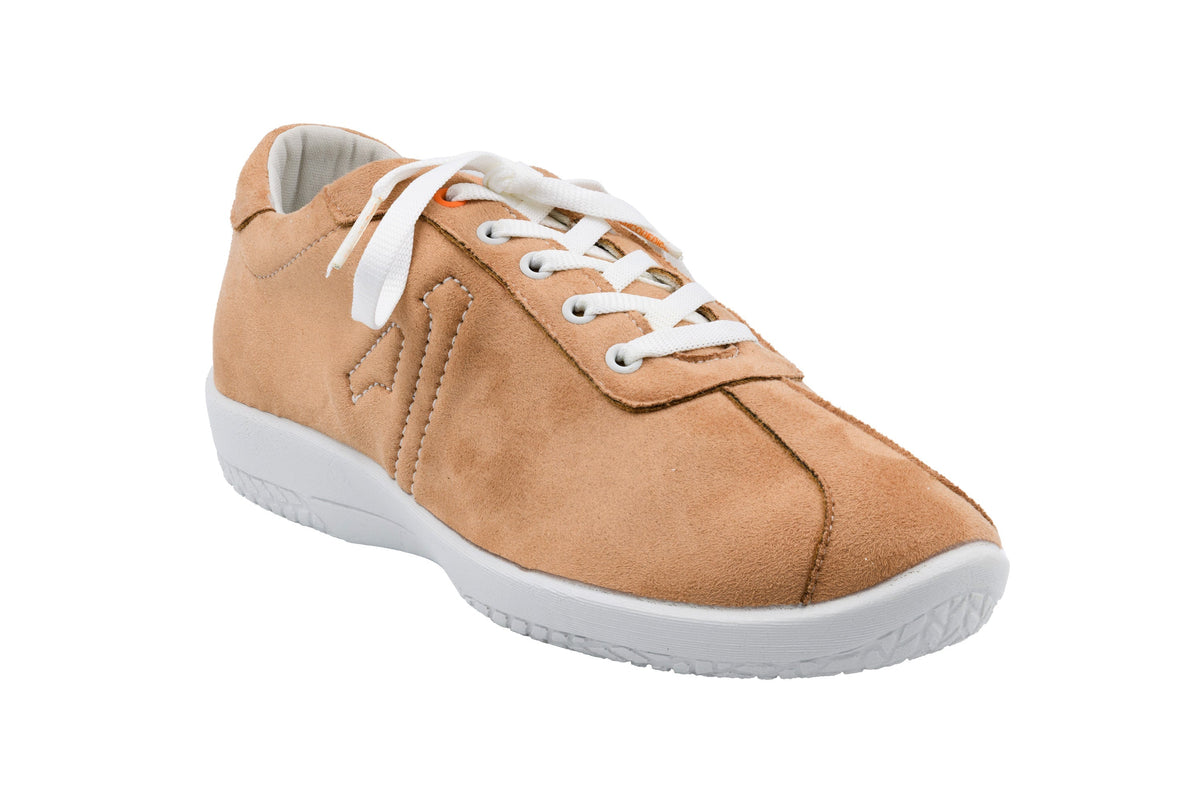 Tan sneaker with white laces on a white background